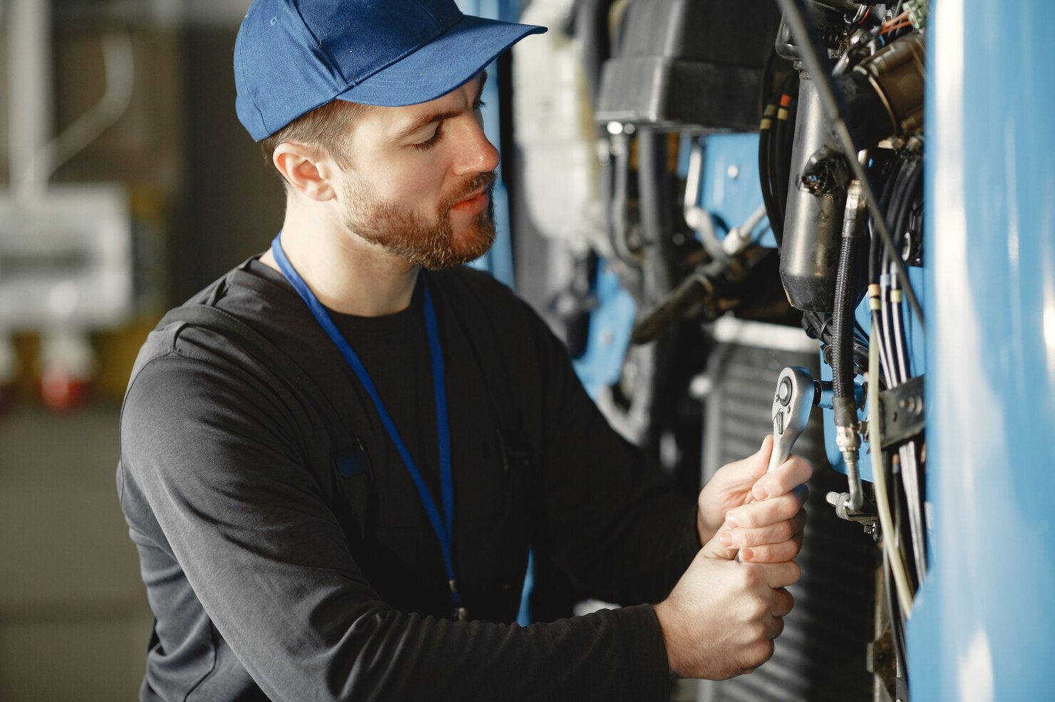 car mechanic repairs blue car garage with tools 1157 46532
